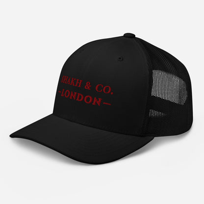 Shakh & Co. Bordeaux embroidered trucker cap, black — left front